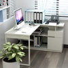 Modern home office setup with white L-shaped desk and dual monitor workspace