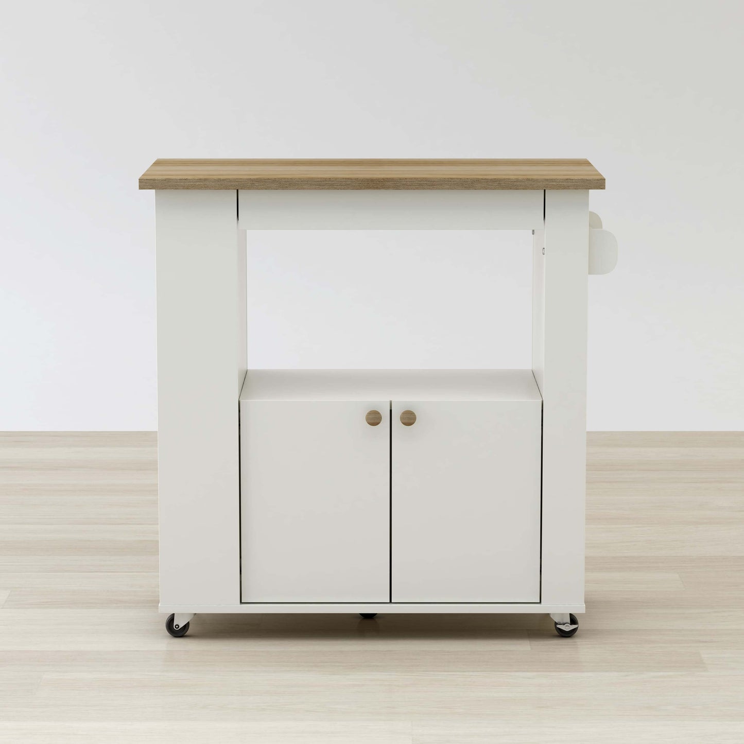 Rolling kitchen cart with vertical storage slots and towel rack handle