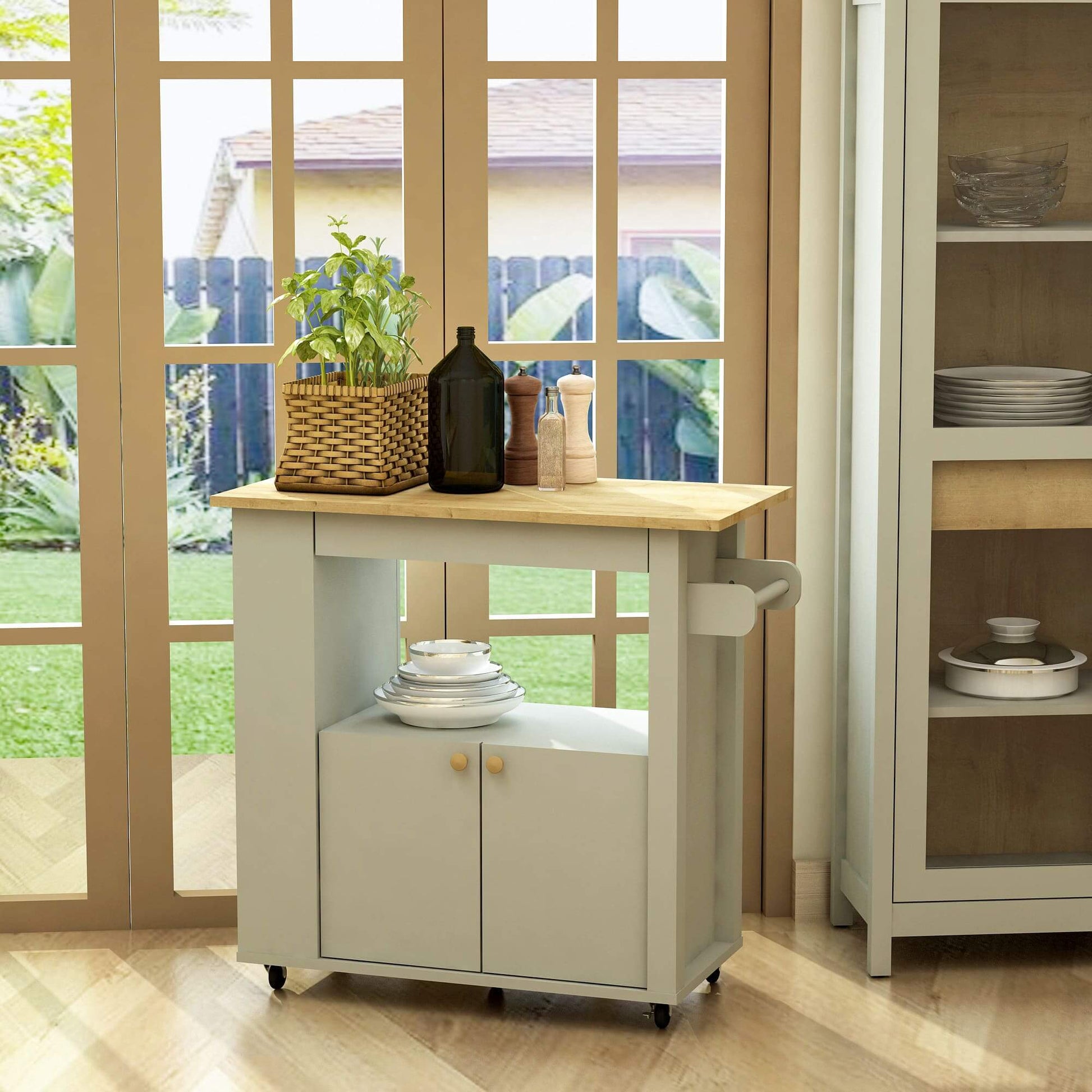 Lifestyle image of Astor kitchen cart styled in home kitchen with accessories