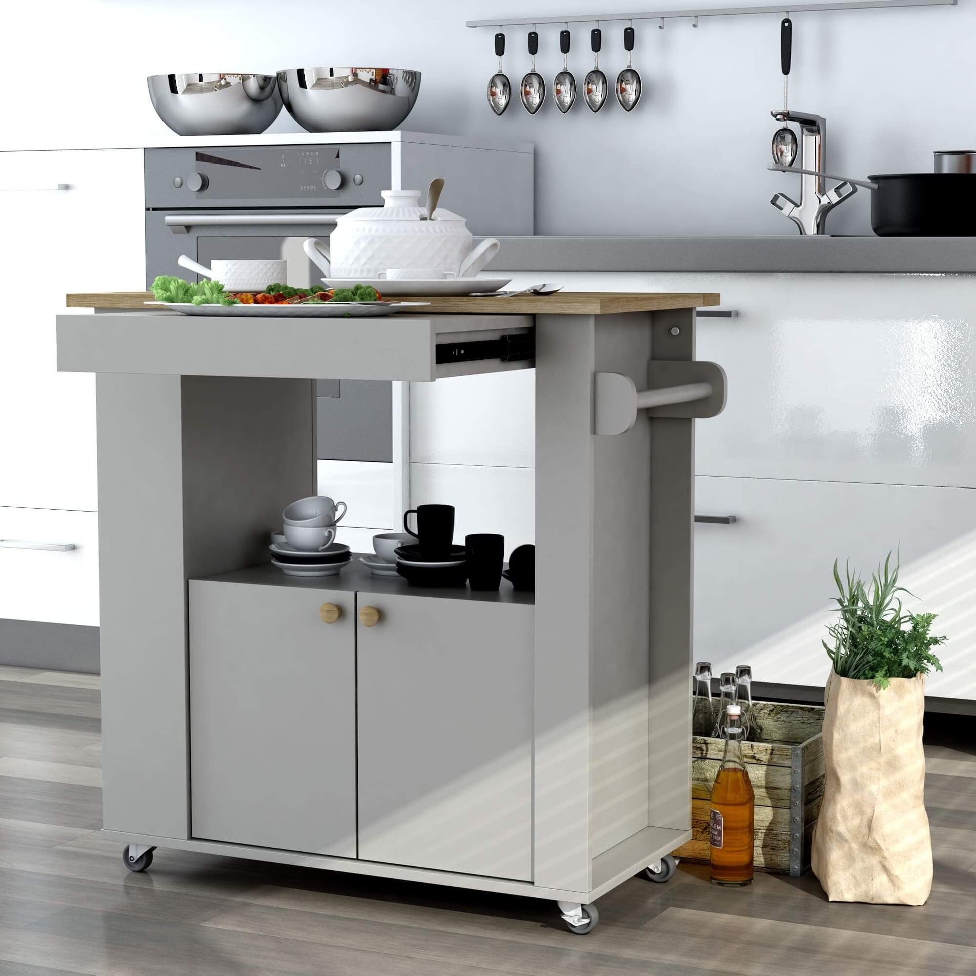 Rolling kitchen cart with vertical storage slots, towel bar, and smooth-glide wheels